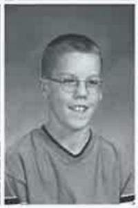 Conrad Gary in his 8th Grade yearbook photo from McGugan